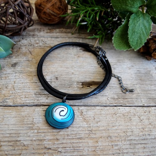 Turquoise Spiral Pendant on a Black Leather Necklace