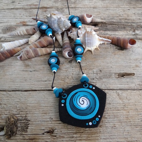 Long Black Statement Necklace with a Turquoise Spiral Pattern