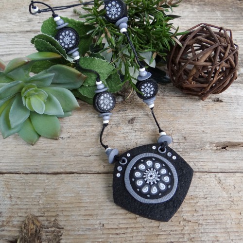 Long Black and White Necklace with a Spiral Pattern