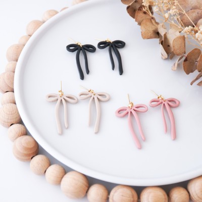 Viseči uhani pentlja - unikatni ženski uhani