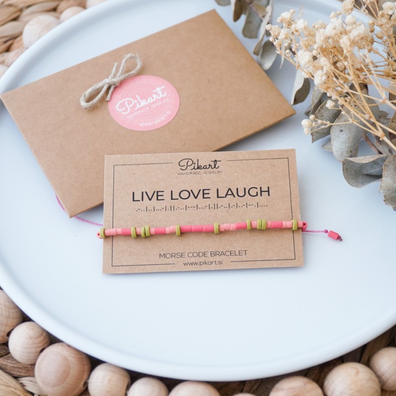 Oranžno roza personalizirana zapestnica z napisom v Morsejevi abecedi