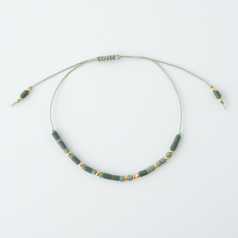 Zeleno zlata personalizirana zapestnica z napisom v Morsejevi abecedi