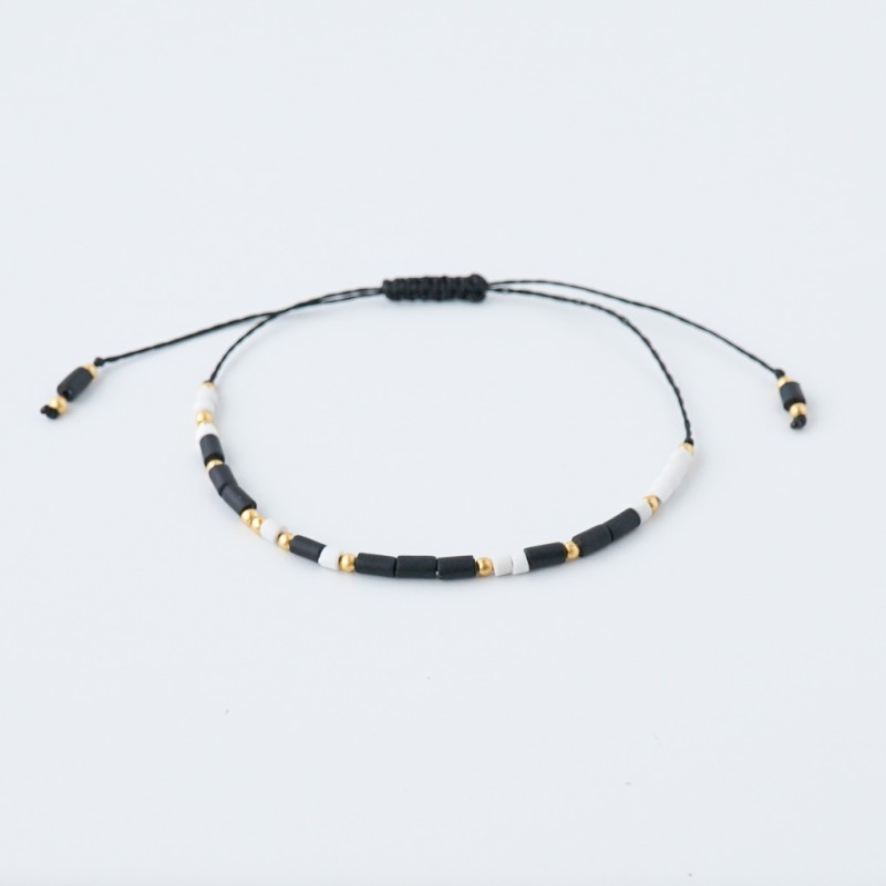 Črno bela zlata personalizirana zapestnica z napisom v Morsejevi abecedi